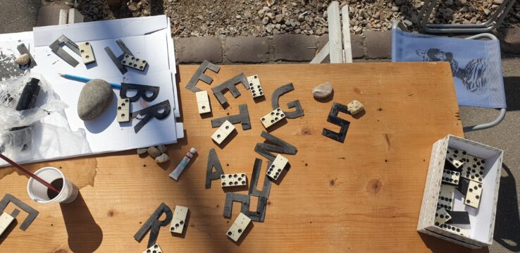 Domino und Buchstaben